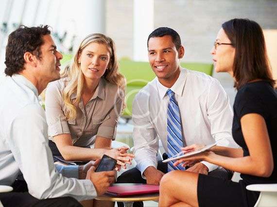 Business team in casual office meeting